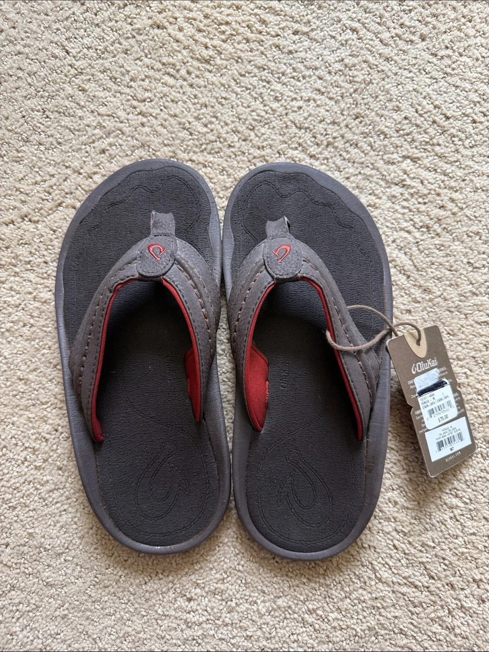 OluKai Hokua Dark Brown Flip Flops with Red Trim - Men’s 7